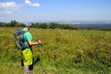 Traveling on a bright summer day in the mountains