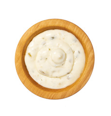 Tartar sauce in wooden bowl isolated on white background.Top view