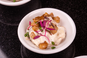 Mushrooms sauce with green onions and greens