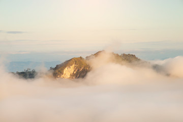 Mountain fog sky clouds landscape in the morning.