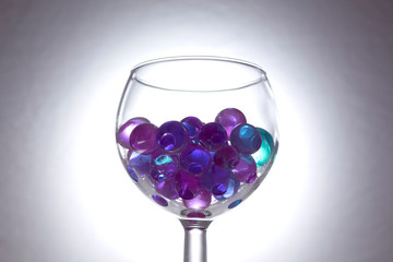 Colorful hydrogel balls in a glass	