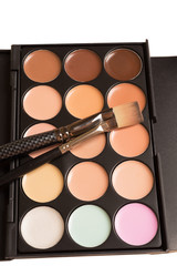 Makeup brush and make-up concealer palette