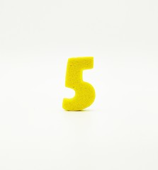 Yellow number five on white background - 240269427