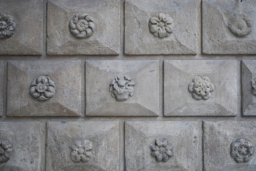 Bologna, Italy - December 18, 2018 : Decorated tiles in Bologna