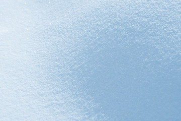 Fresh snow background texture. Winter background with snowflakes and snow mounds. Snow lumps.