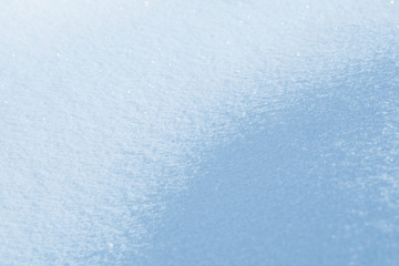 Fresh snow background texture. Winter background with snowflakes and snow mounds. Snow lumps.