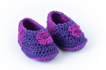knitted baby slippers, handmade shoes made of purple yarn for a little girl
