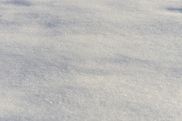snowdrift surface on a sunny winter day
