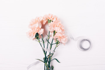Pale pink ink flowers with silver ribbon