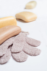 high-grade natural aroma soaps with washing mitten at wite background