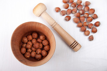 Wooden mortar with nuts