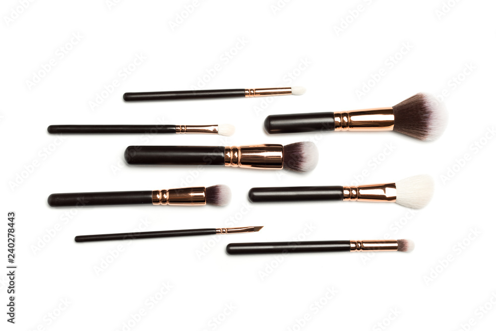 Wall mural set of brushes for powder. powder brush set. cosmetic brush. cosmetic product. powder brush over whi