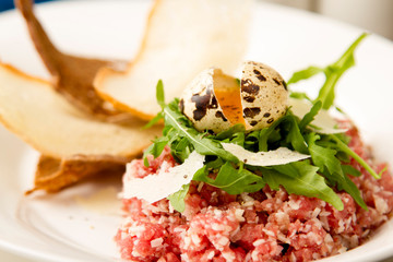 beef tartare with quail egg