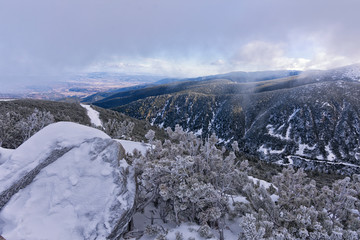 Fototapeta na wymiar winter landscape with mountains and blue sky