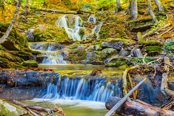 small waterfal on a mountain river