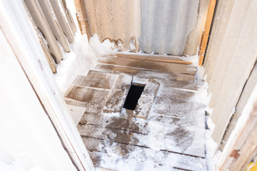 Old toilet in the countryside in winter