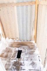 Old toilet in the countryside in winter