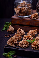 Coffee creamy fudge on a dark wooden board