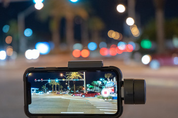 Phone in city at night