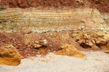 closeup of stone on the beach, sea coast with high hills, beautiful wild landscape