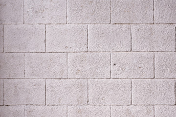 gray concrete wall with brick pattern, texture