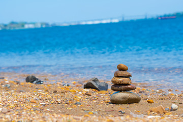 Zen Rocks Stacked by the Beach