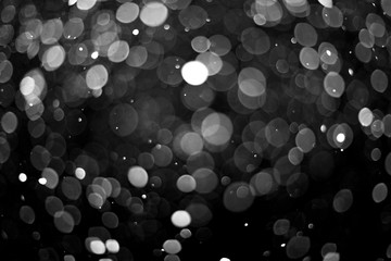 Snowfall on black background