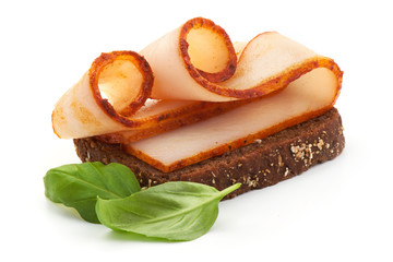 Sandwich with basil leaves, Sliced lard with paprika, bacon, close-up, isolated on white background