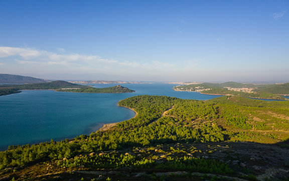 Landscape of Devil's Table (Seytan Sofrasi) in Ayvalik, Aegean District in Turkey. Blue and green collaboration. Aerial view of famous touristic place as known Seytan Tepesi. High altitude. Acrophobia