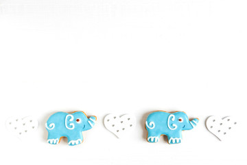 Frame for the design of a baby banner, greeting card. Background for baby banner. Children banner with elephants. Base for banner with gingerbread-elephants