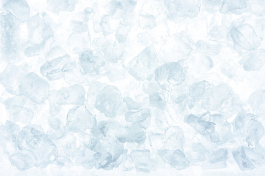 Pieces of crushed ice background. Ice cubes on white background.