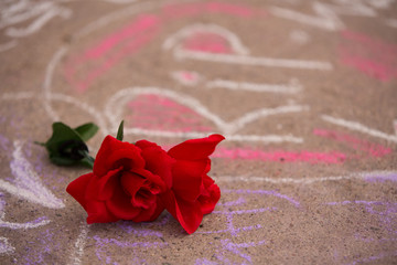 Memorial graffiti in chalk on a sidewalk in San Diego for Day of the Dead