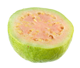 Ripe pink apple guava (Psidium guajava) fruit cut in half across isolated on white background