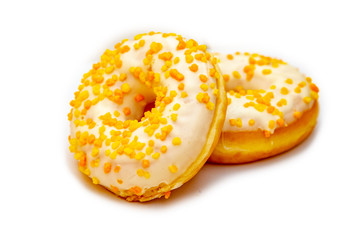 Donuts with candied orange and lemon crusts. On white background, isolated.