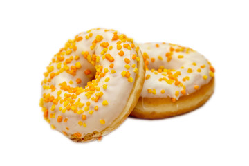 Donuts with candied orange and lemon crusts. On white background, isolated.