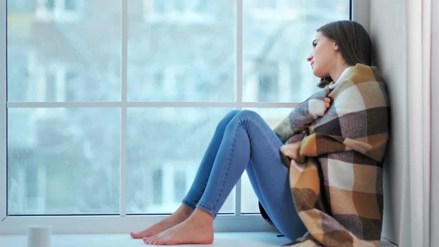 Pensive Barefoot Woman Shrink From Cold And Bundle Up Warmer On Plaid