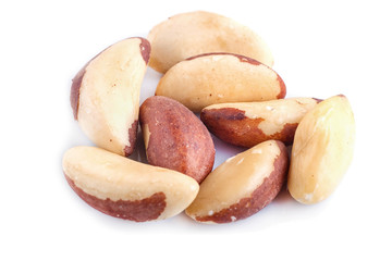 Pile of Brazil nuts  isolated on white background.