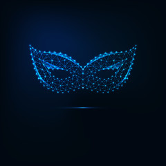 Glowing low poly carnival masquerade mask made of lines, stars, triangles on dark blue background. © Inna