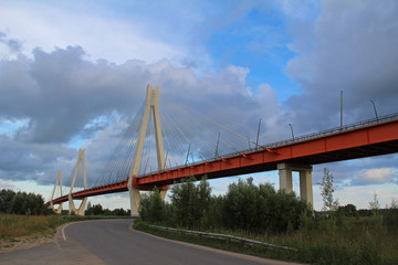 Fototapeta na wymiar Summer landscape with a view of the cable-stayed bridge on the river Oka, Murom, Russia.