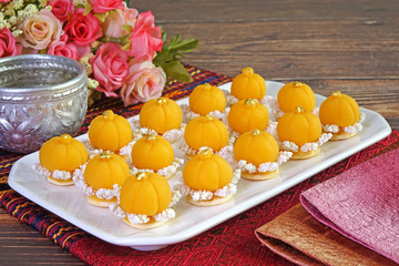 Thai dessert / Royal Thai cuisine : Golden crown cake (Khanom Dara Thong or Thong Eak krajang) , Most famous of nine auspicious desserts in Thai tradition, made from yolk, wheat flour and edible gold