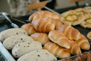 Close up of bakers are working.Homemade bread.Eating breakfast with the bread in coffee shop. Morning coffee,Bakery commercial image.