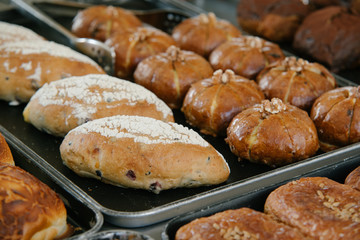 Close up of bakers are working.Homemade bread.Eating breakfast with the bread in coffee shop. Morning coffee,Bakery commercial image.