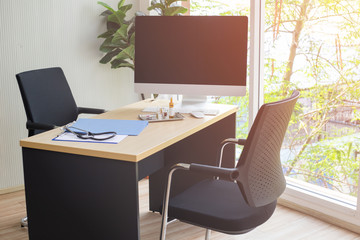 Doctor's office with computer and Medical Devices.