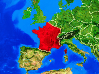 France from space on model of planet Earth with country borders and very detailed planet surface.