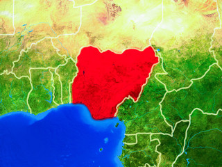 Nigeria from space on model of planet Earth with country borders and very detailed planet surface.