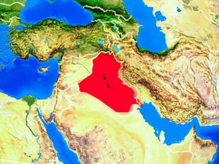 Iraq from space on model of planet Earth with country borders and very detailed planet surface.