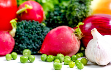 a fresh group of vegetables on white background