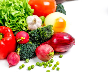 a fresh group of vegetables on white background