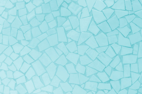 Broken tiles mosaic seamless pattern. Pastel Blue tile wall high resolution real photo or brick seamless and texture interior background.