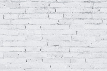 White brick wall art concrete or stone texture background in wallpaper limestone abstract paint to flooring and homework/Brickwork or stonework clean grid uneven interior rock old.